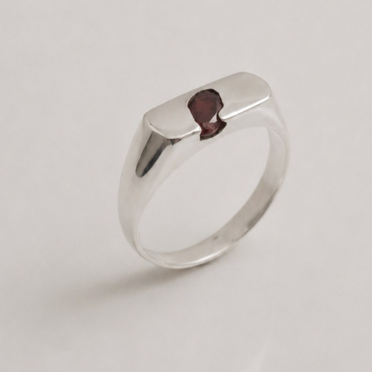 OIAM No. 4, sterling band set with a red garnet