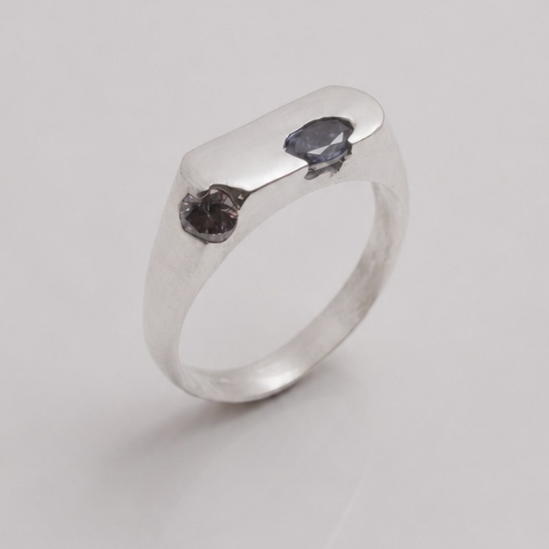 OIAM No. 5, sterling band set with an oval blue-violet stone and a champagne accent